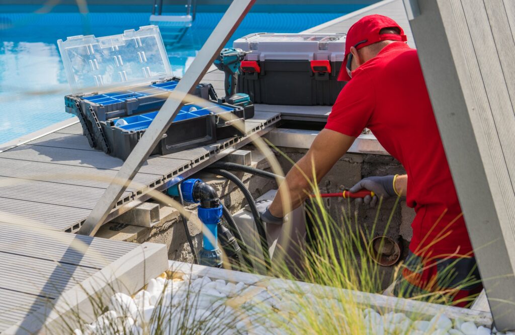 Technician Fixing Swimming Pool Heating System