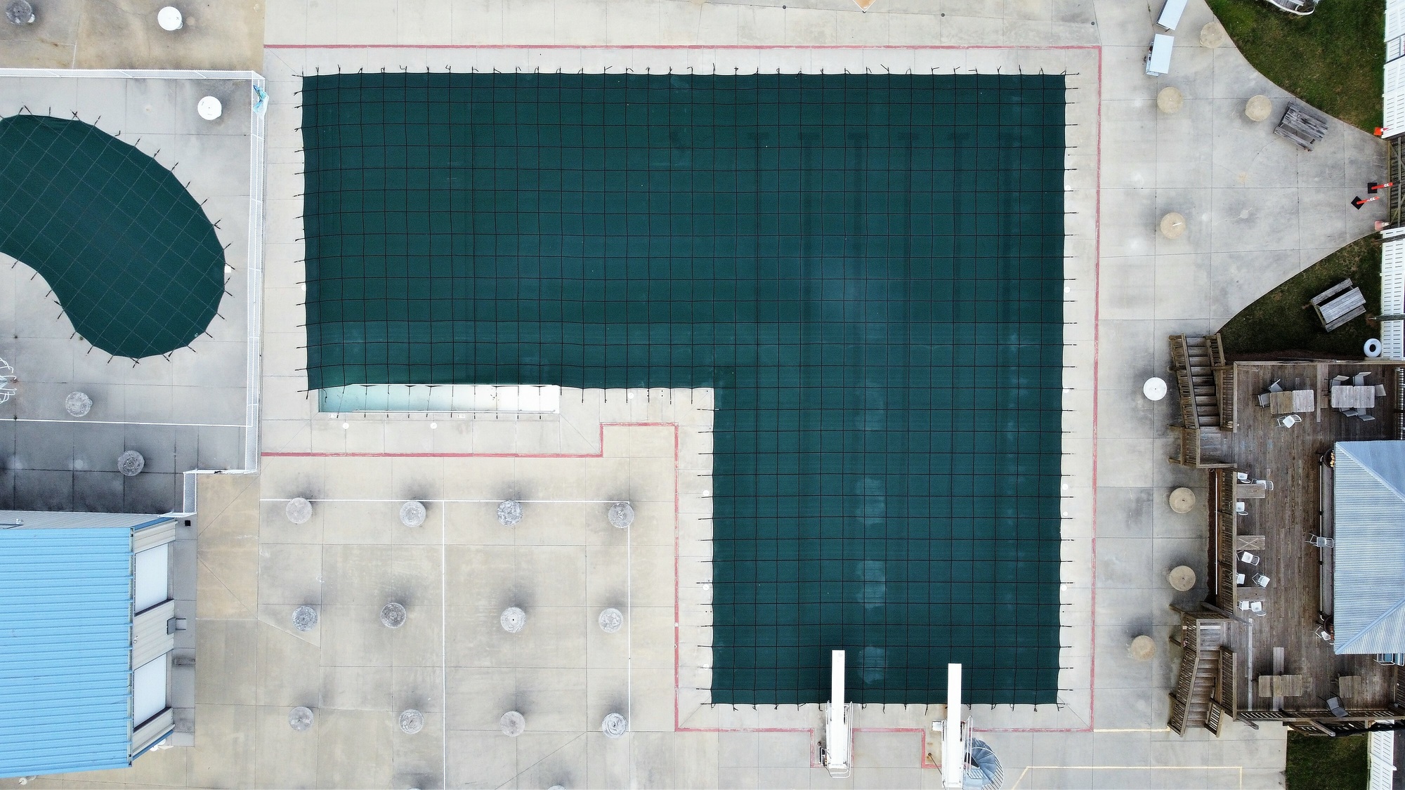 Top view of a winterized pool outdoors